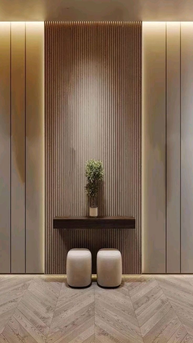 مؤسسة اصباغ - تصميم غرفة معيشة مودرن مع جدار تلفزيون خشبي وإضاءة خلفية